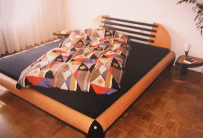   Bett in Buche massiv